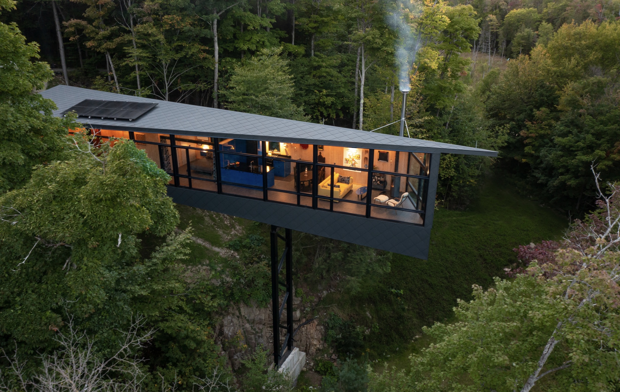 Designer M.O.R.E. Cabin is Perched into the Forests of Quebec